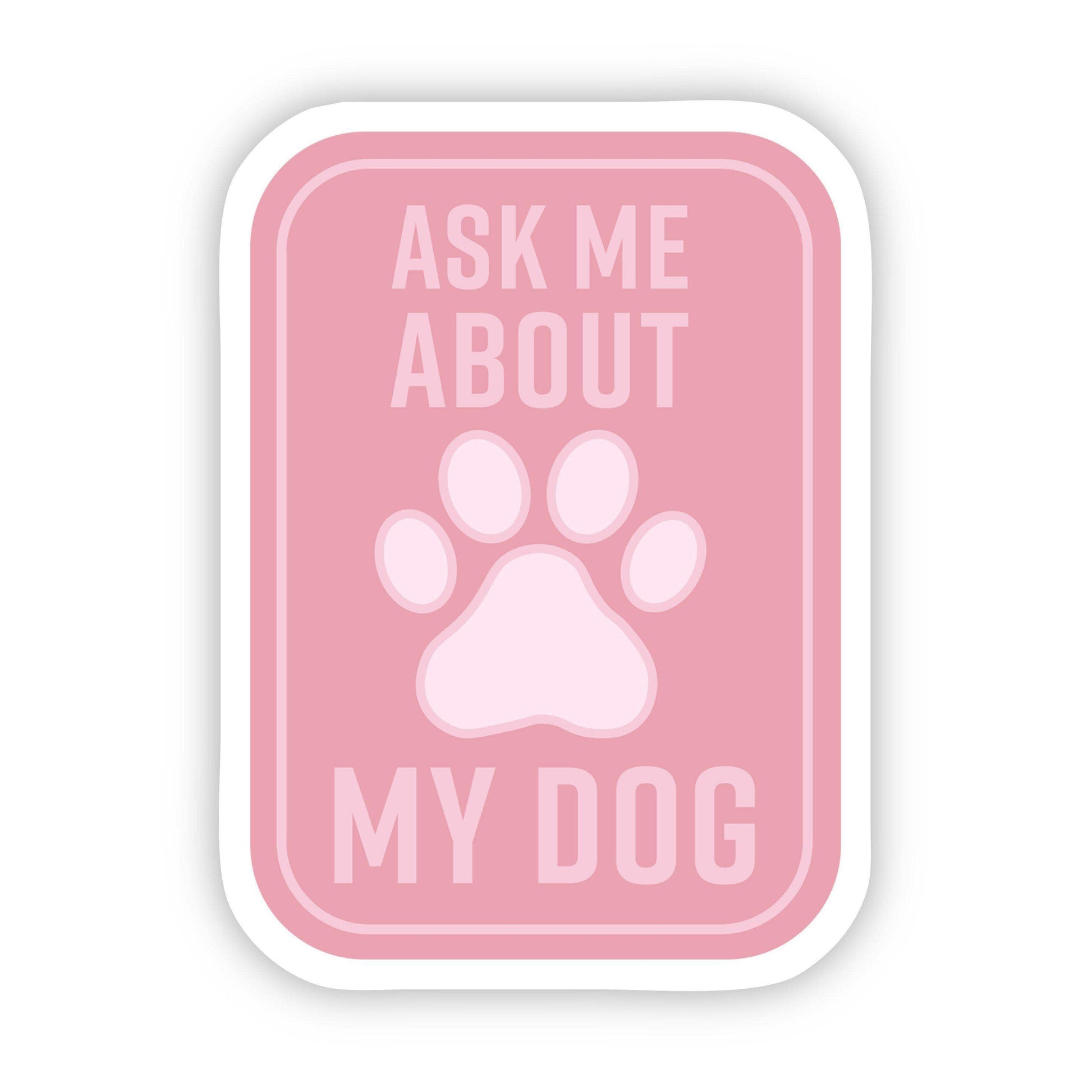 A sticker designed by  Anna Alsup that says "Ask me about my dog"
