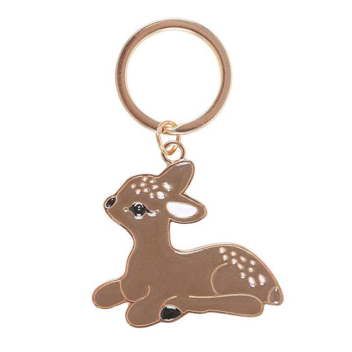 Closeup of enamel keychain of a baby deer woodland critter named Felciity Fawn.