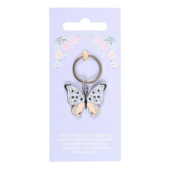 Butterfly keychain on backing card with sentiment, "Like a butterfly, you gracefully navigate life..."