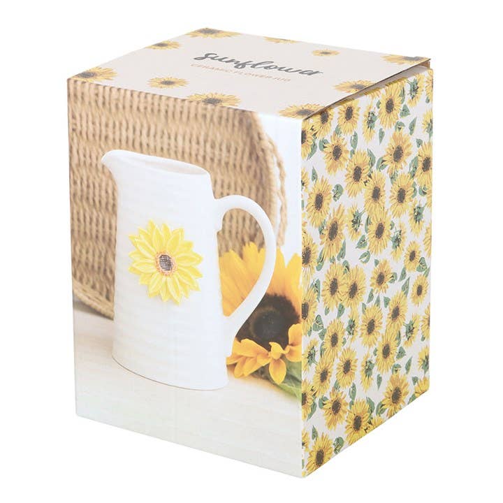 Box for ceramic flower vase shaped like a water jug with a 3D sunflower design. Sunflower pattern on side of box.
