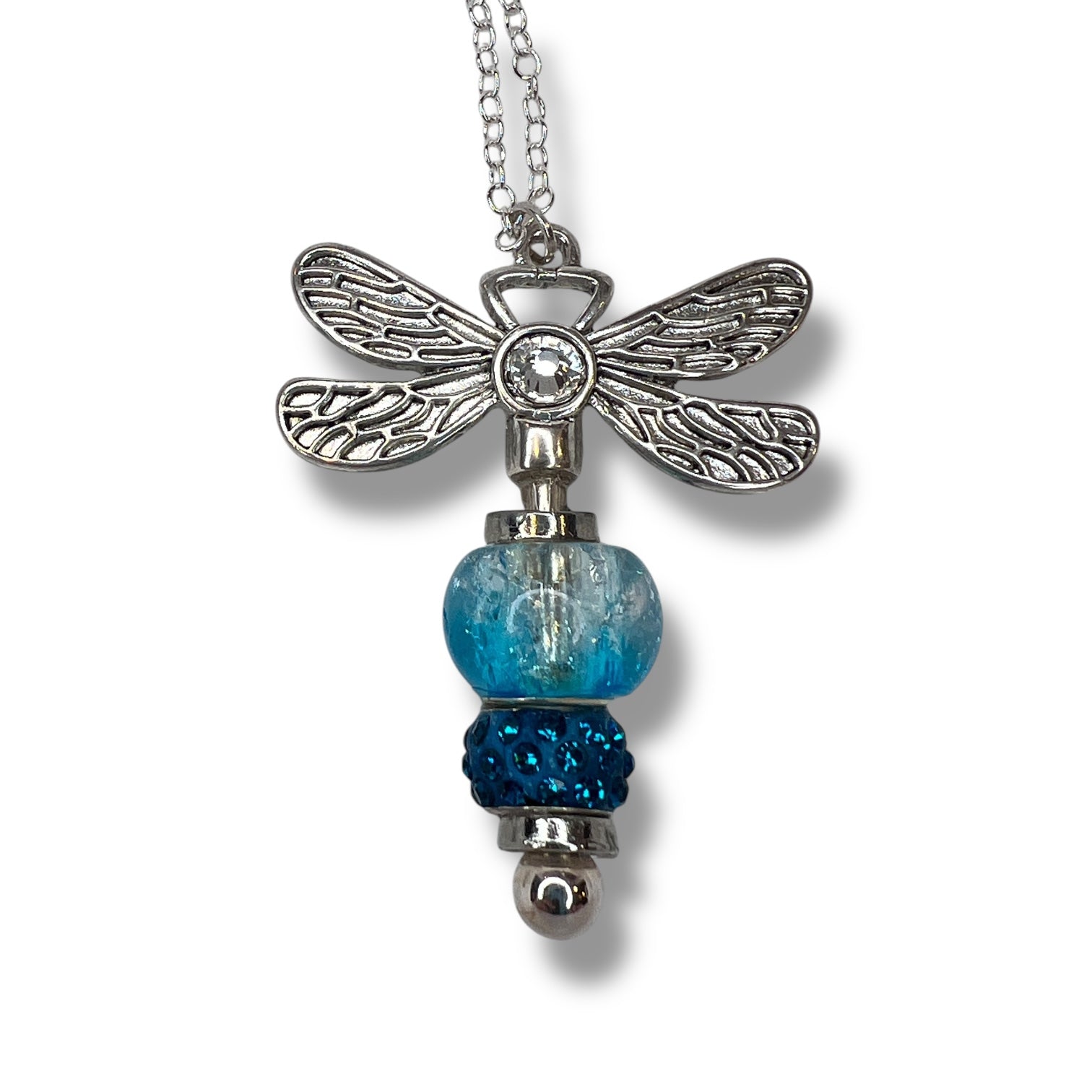 Handmade dragonfly necklace with a blue beaded tail.