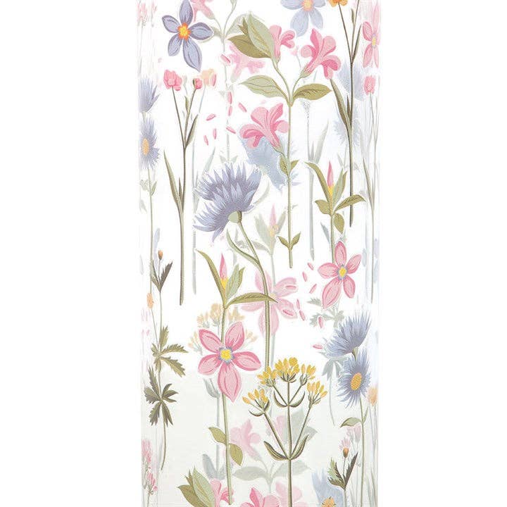 Close up of flower pattern design on floral glass water bottle.
