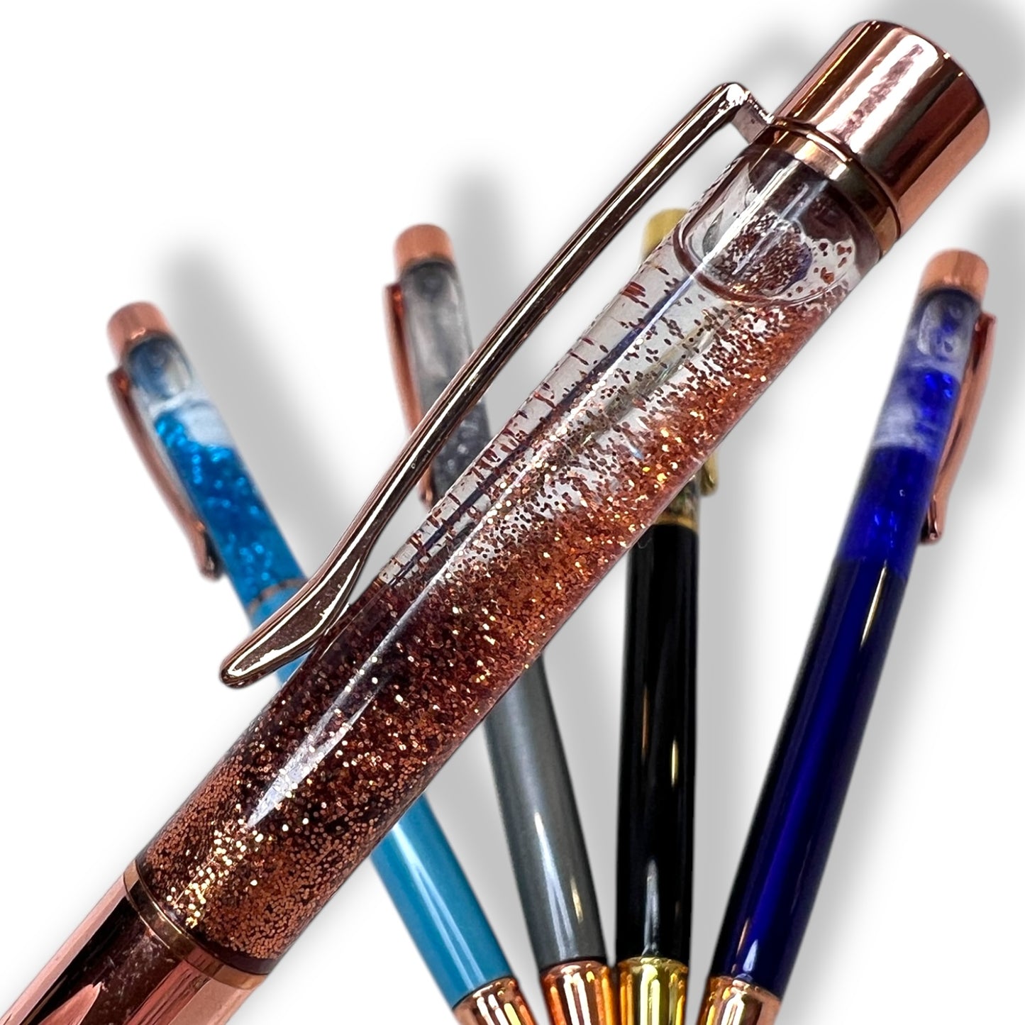 Colorful pens with matching glitter that floats.