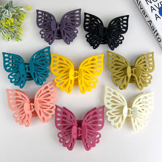 Large butterfly hair claw in a variety of colors.