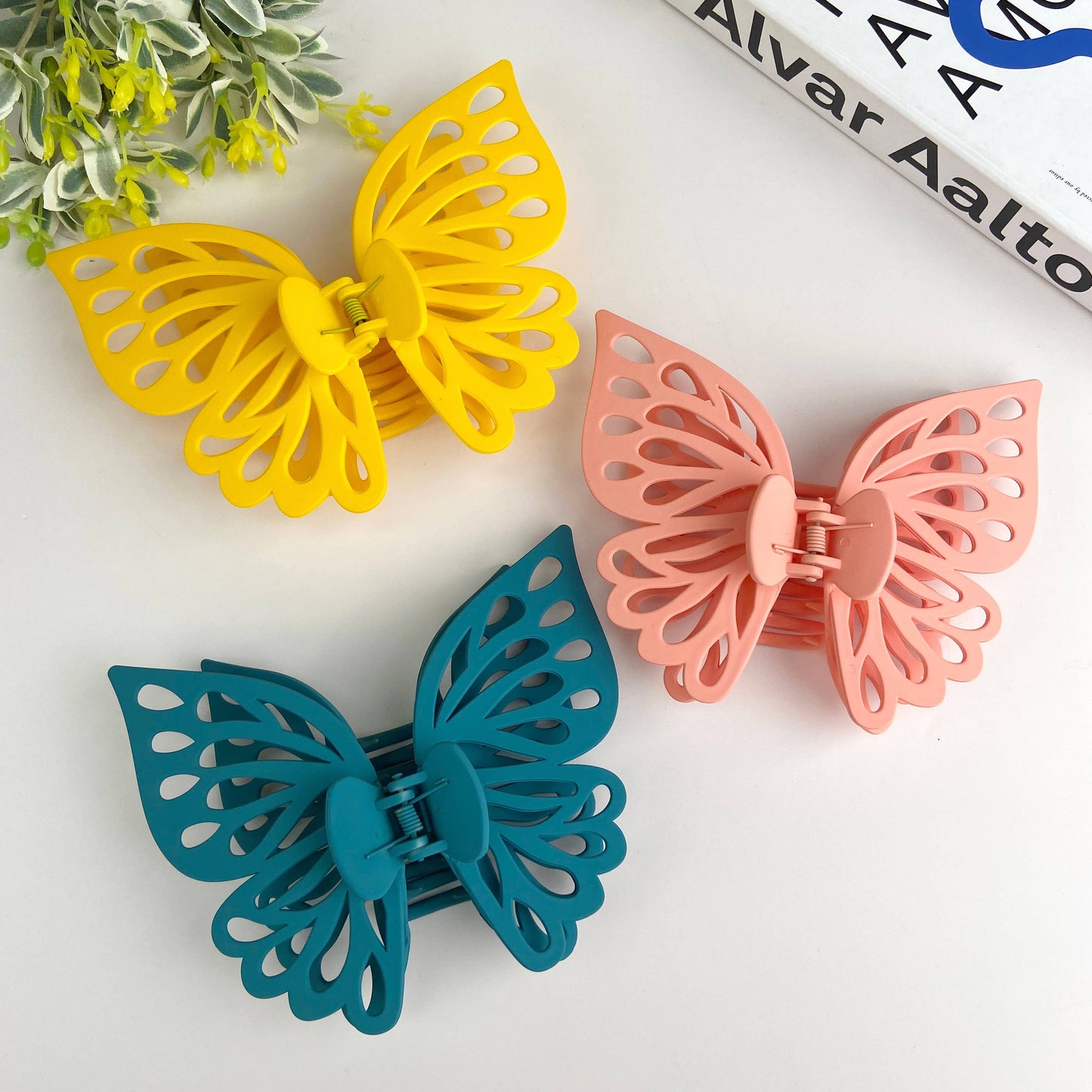 Three butterfly hair claws.