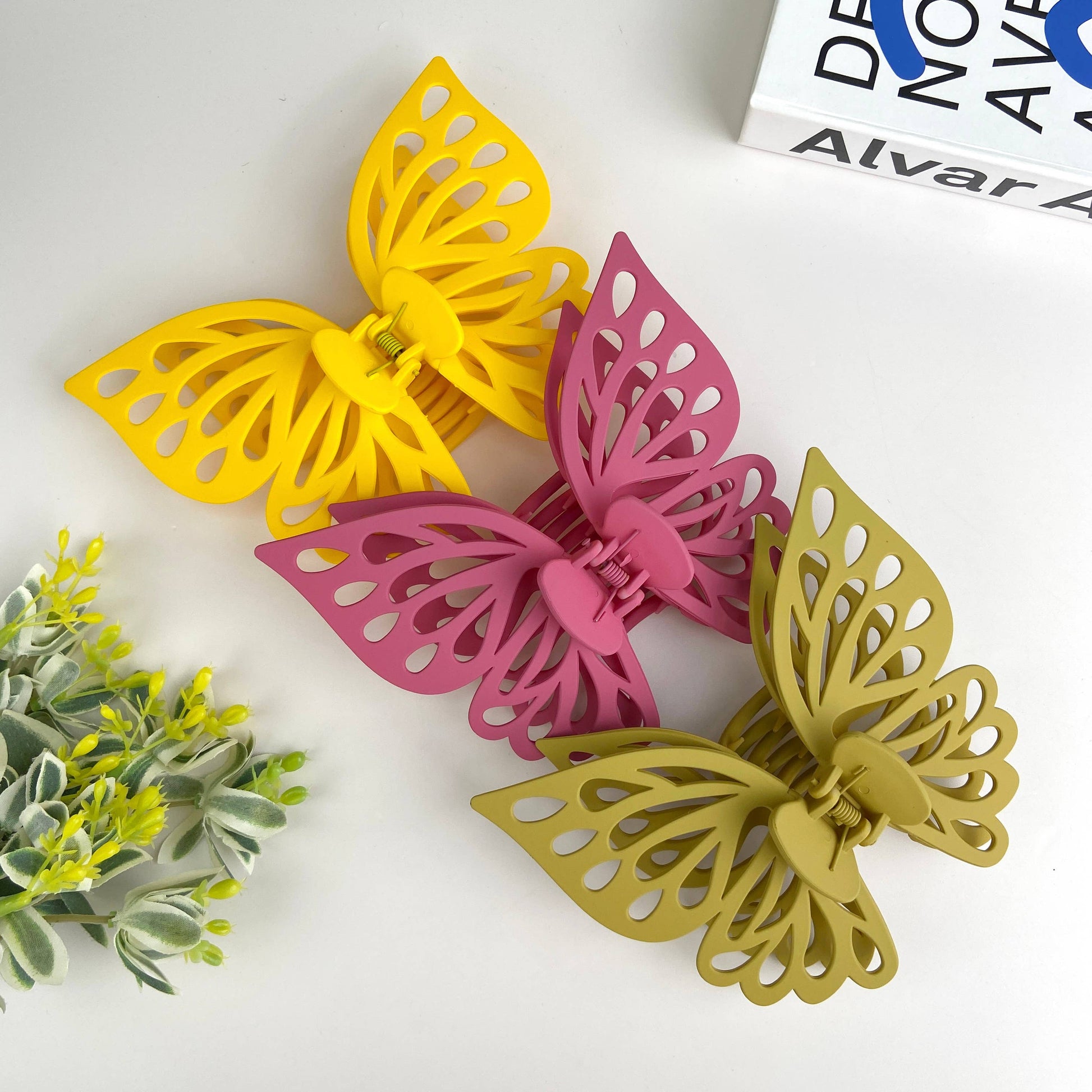 Three butterfly hair claws.