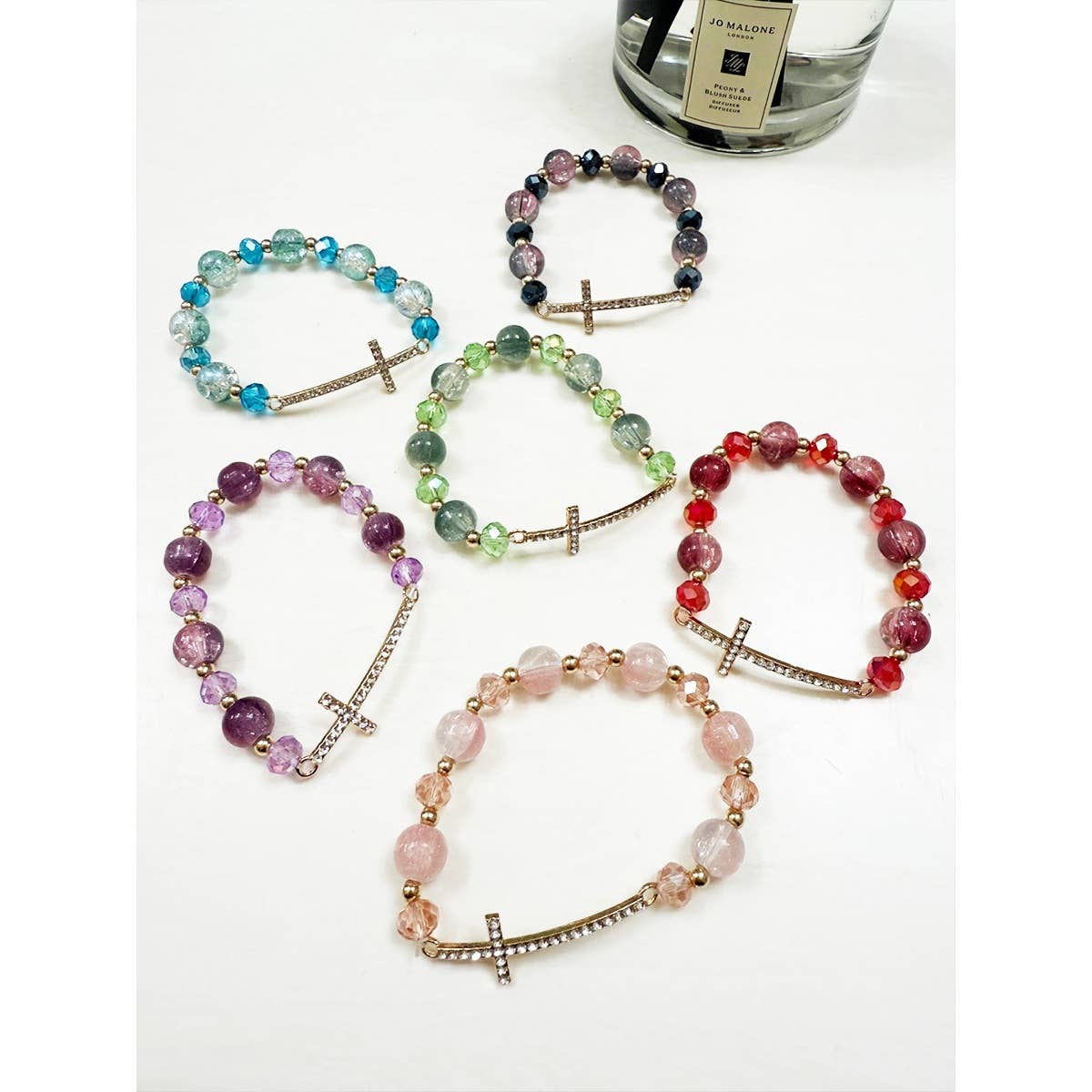 Rhinestone cross beaded stretch bracelets.