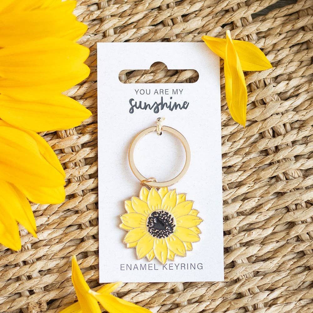 Sunflower keychain on a card with the sentiment "you are my sunshine."