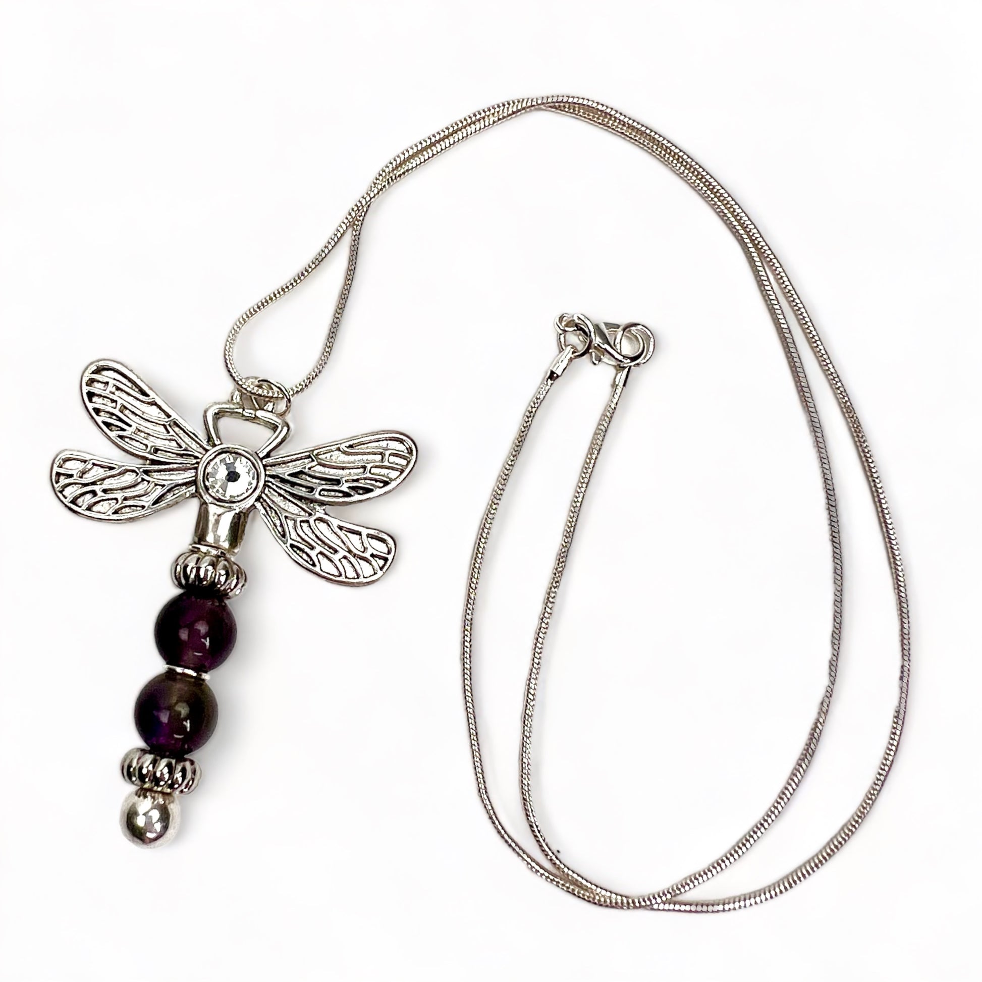 View of full snake chain with amethyst dragonfly necklace