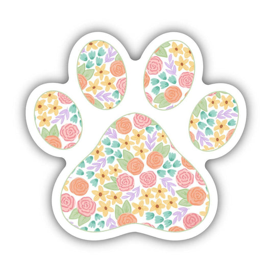 A paw print shaped sticker with a colorful floral design.