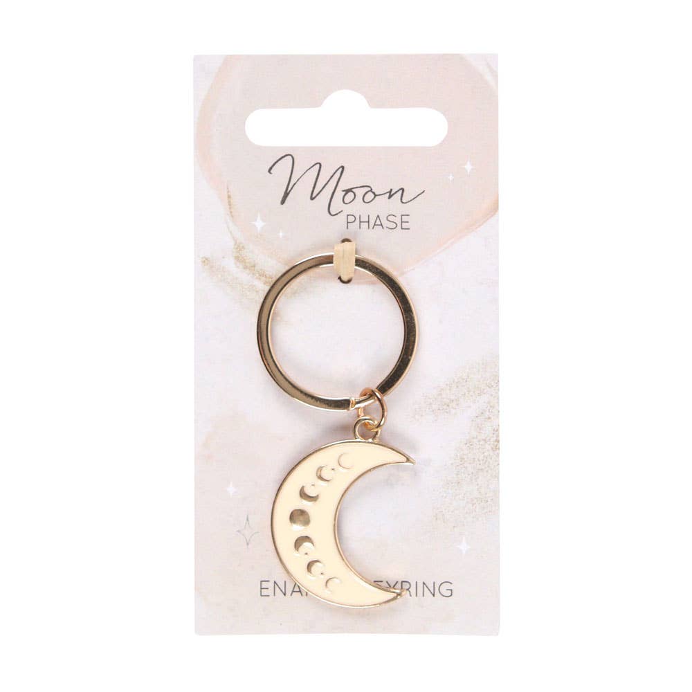 Enamel keychain of a crescent moon decorated with moon phases.