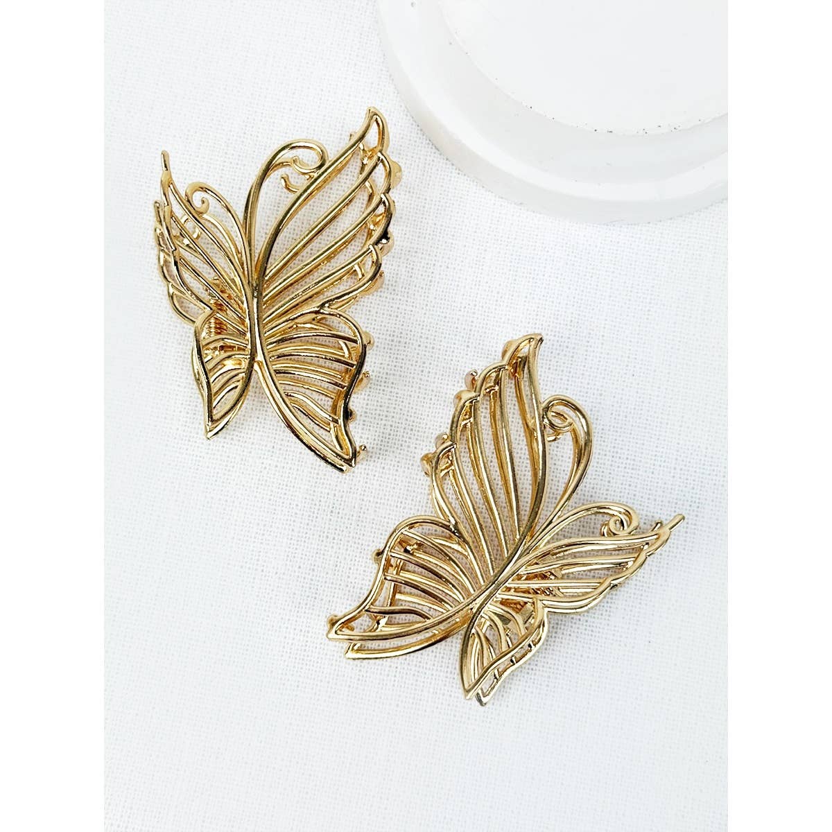 Gold metal butterfly hair claw.