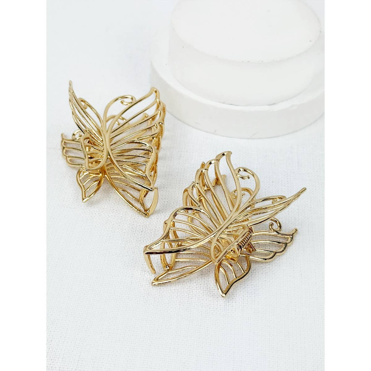 Gold metal butterfly hair claw.