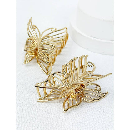 Close up of gold metal butterfly hair claw.